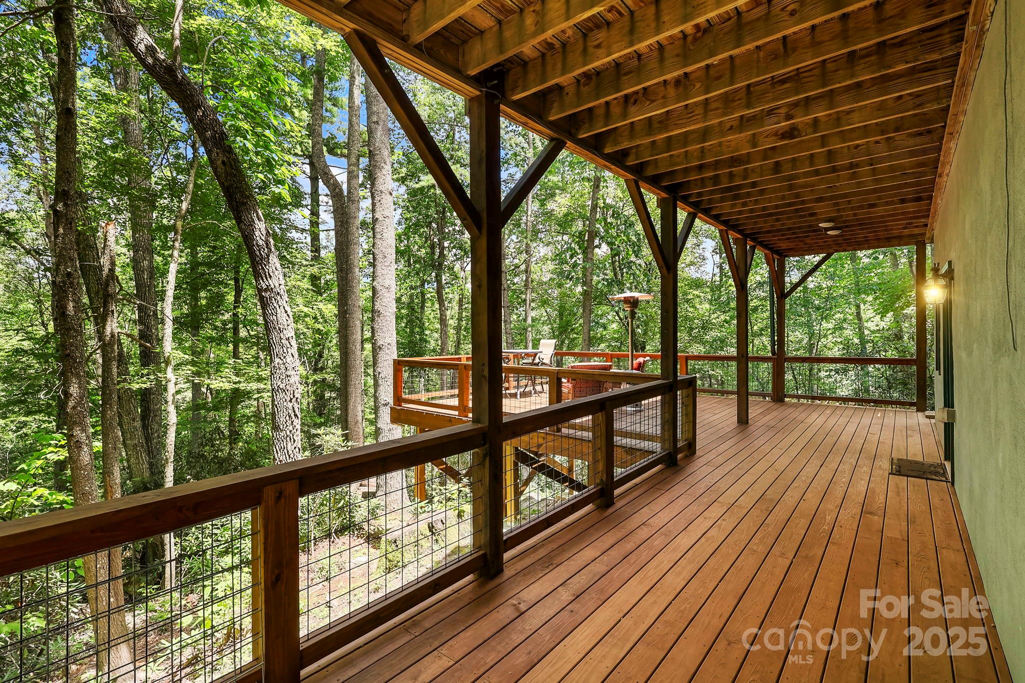 228 Woodby Ridge Road Vilas, NC 28692 - Photo 42 of 46 a view of balcony with wooden floor