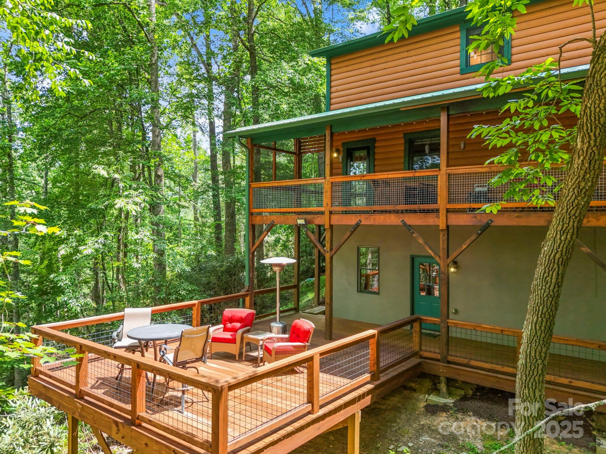 228 Woodby Ridge Road Vilas, NC 28692 - Photo 44 of 46 a view of a chairs and table on the balcony