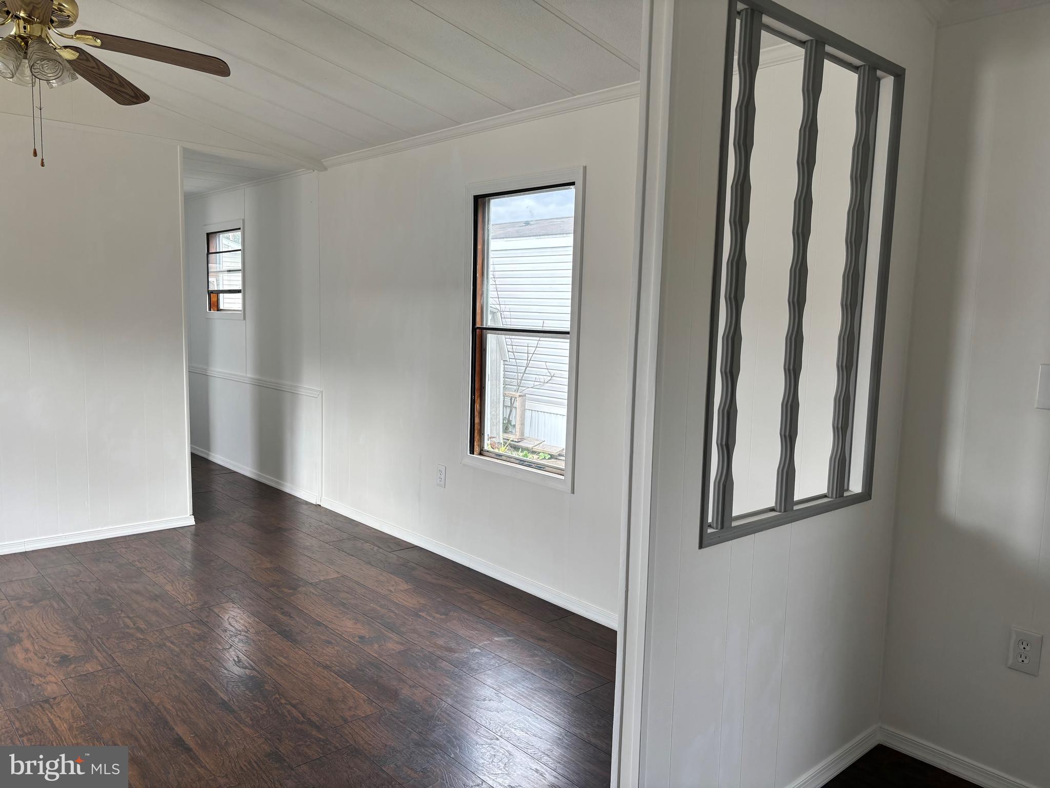 865 Cypress Ave Spring Spring City, PA 19475 - Photo 12 of 33 wooden floor in an empty room with a window