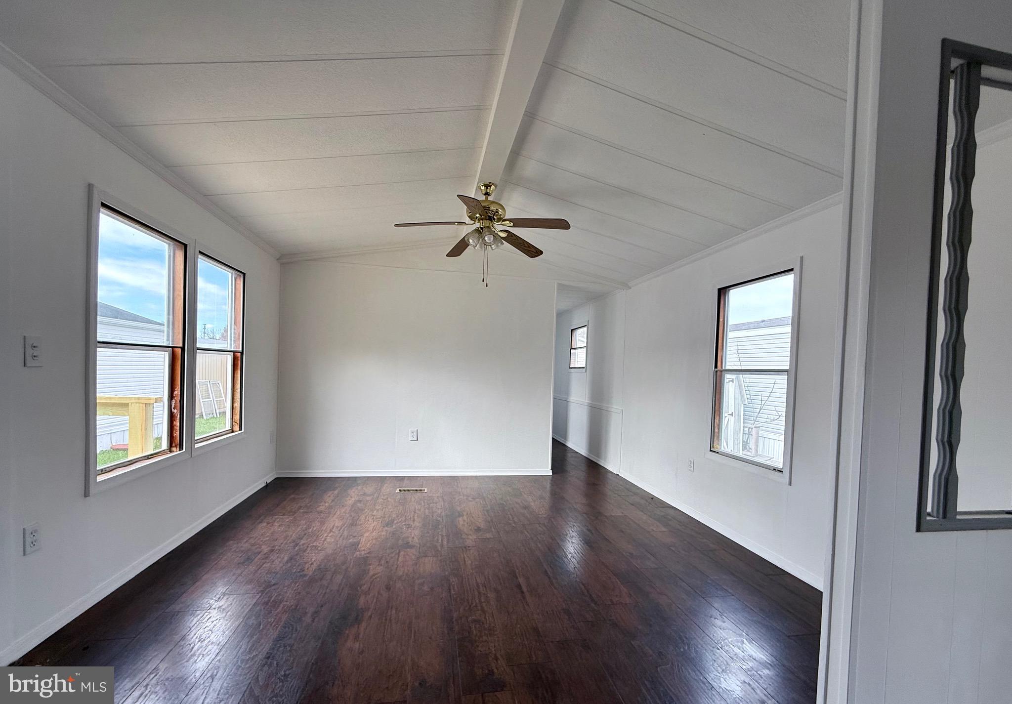 865 Cypress Ave Spring Spring City, PA 19475 - Photo 13 of 33 wooden floor in an empty room with a window