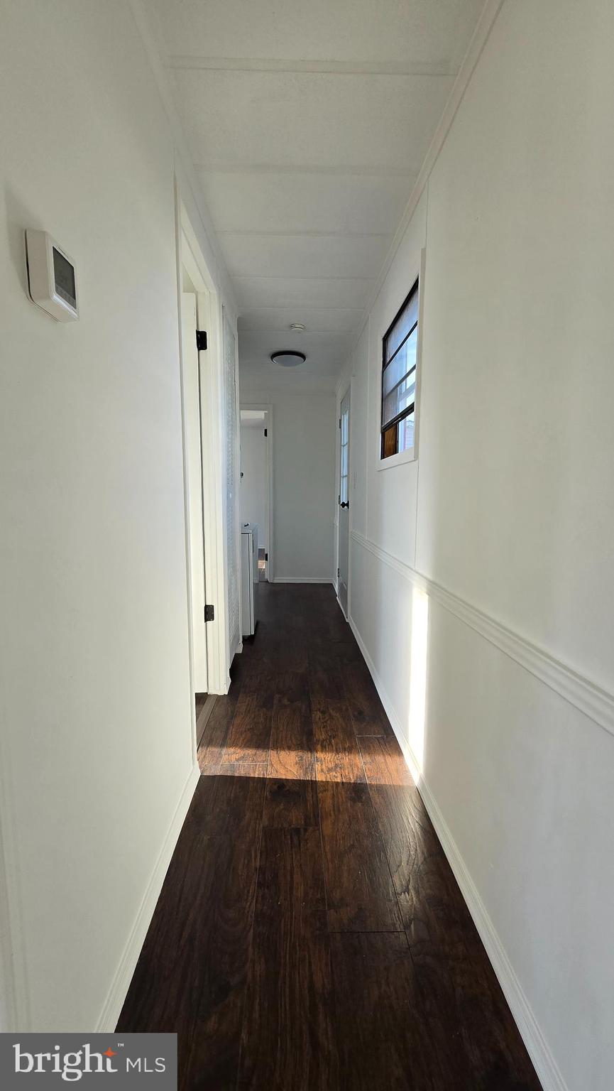 865 Cypress Ave Spring Spring City, PA 19475 - Photo 15 of 33 a view of a hallway with wooden floor