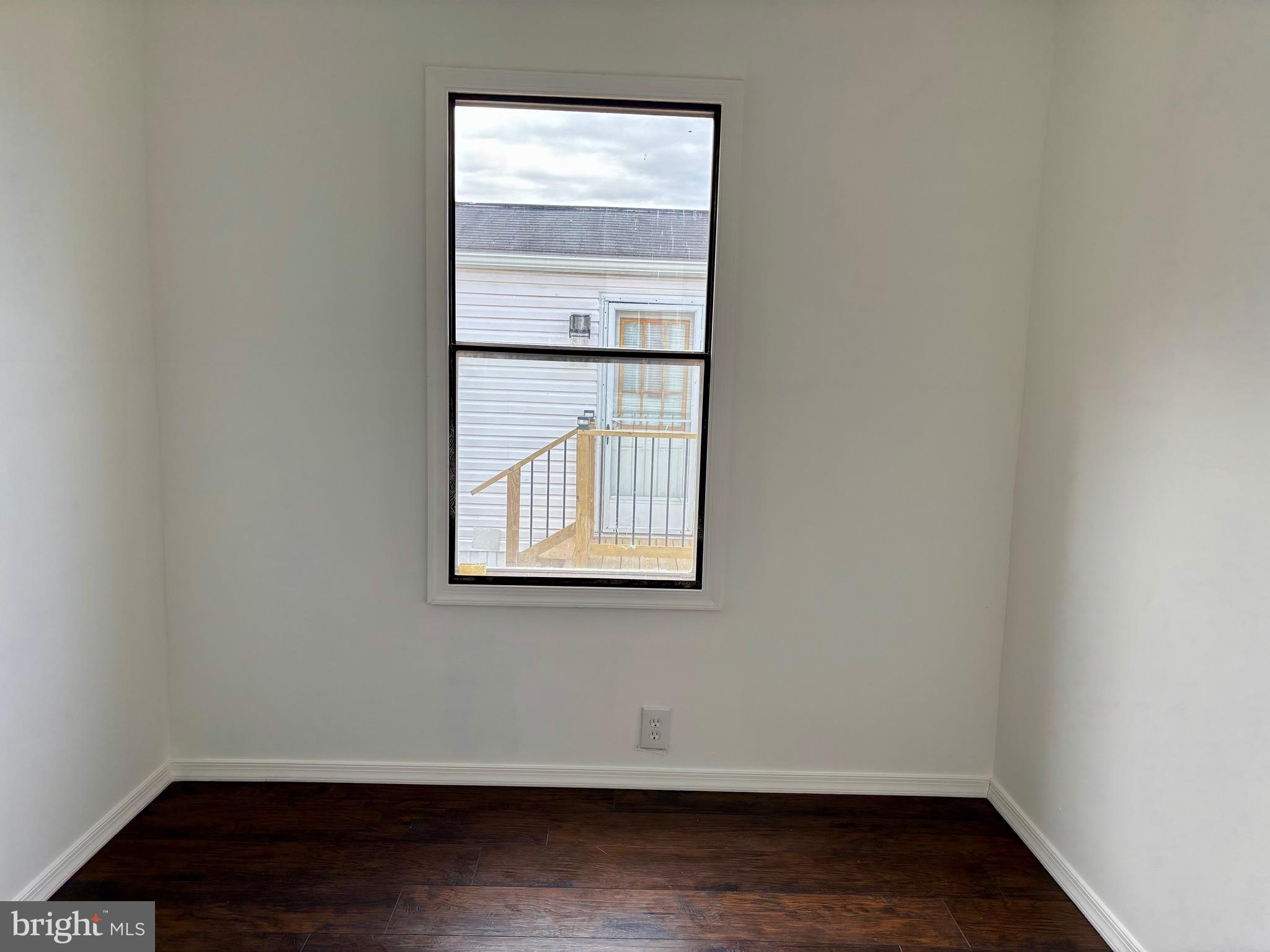 865 Cypress Ave Spring Spring City, PA 19475 - Photo 30 of 33 a view of a small space with wooden floor and a window