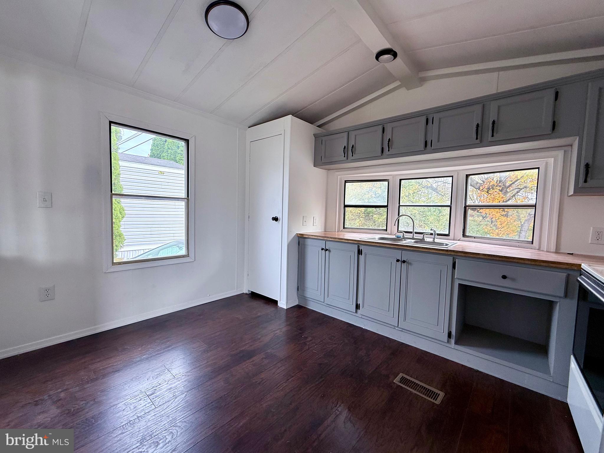 865 Cypress Ave Spring Spring City, PA 19475 - Photo 6 of 33 a view of empty room with wooden floor and fan