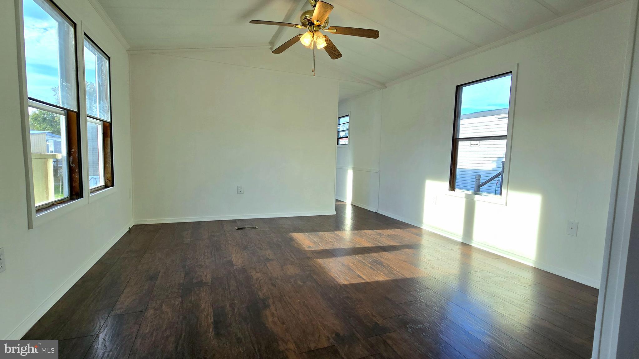 865 Cypress Ave Spring Spring City, PA 19475 - Photo 9 of 33 a view of empty room with wooden floor and fan