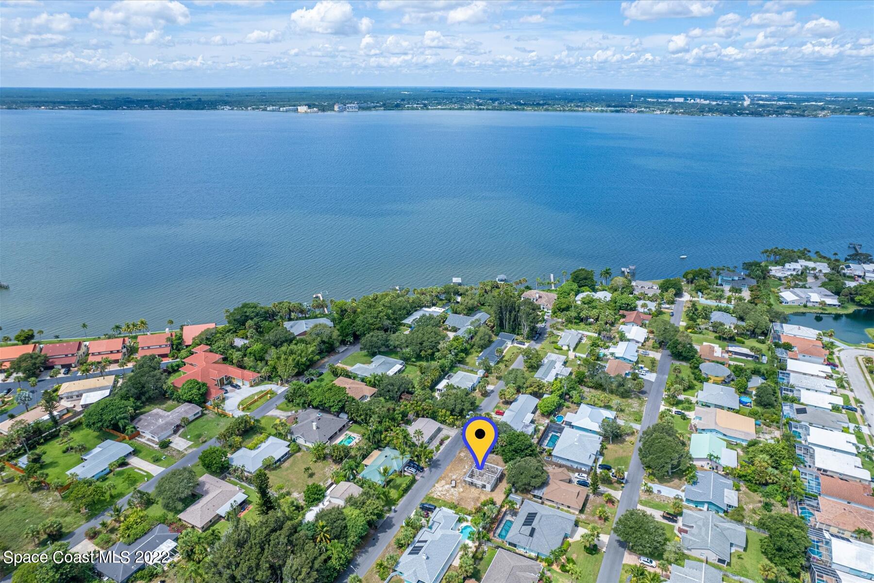 290 Rita Boulevard Melbourne Beach, FL 32951 - Photo 13 of 21 a view of a bunch of flowers in a room
