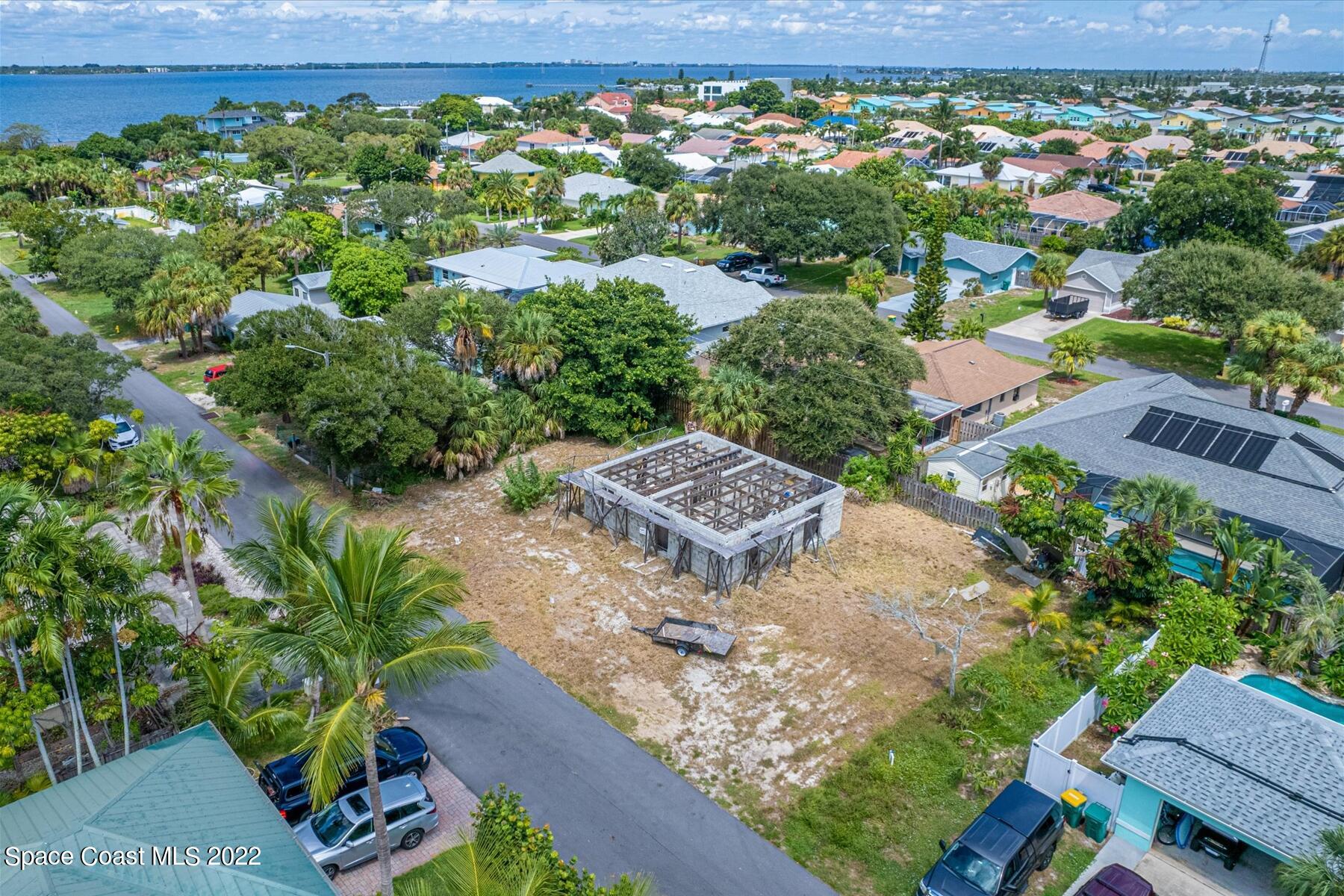 290 Rita Boulevard Melbourne Beach, FL 32951 - Photo 9 of 21 an aerial view of a house with garden space and street view