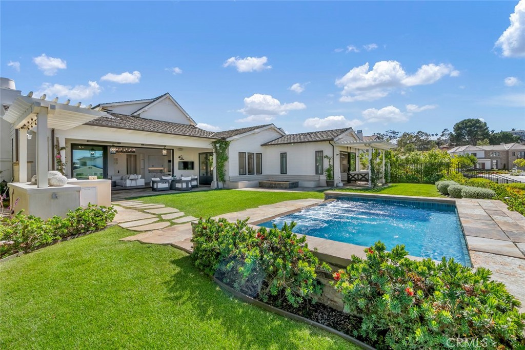 5 Rancho Elastico Road Rolling Hills Estates, CA 90274 - Photo 1 of 48 a view of house with a swimming pool