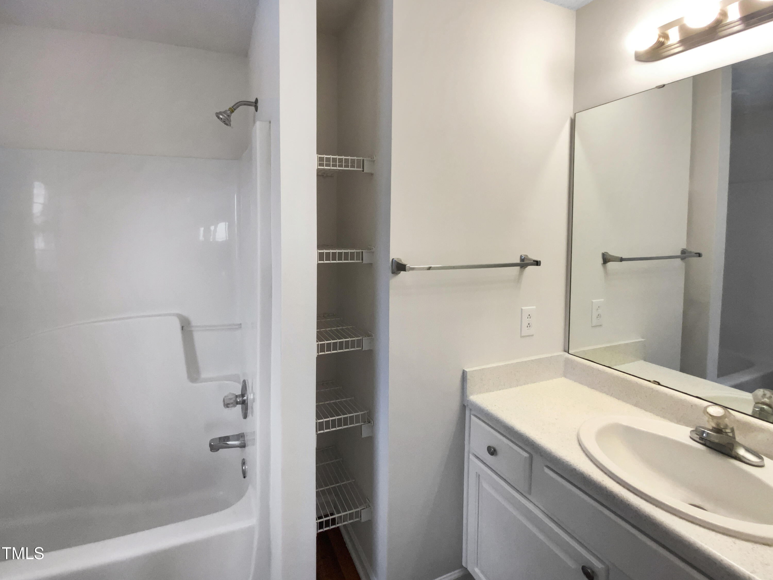 2013 Turtle Point Drive Raleigh, NC 27604 - Photo 11 of 20 a bathroom with a granite countertop sink and a mirror