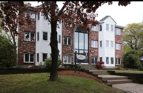 front view of house with a yard