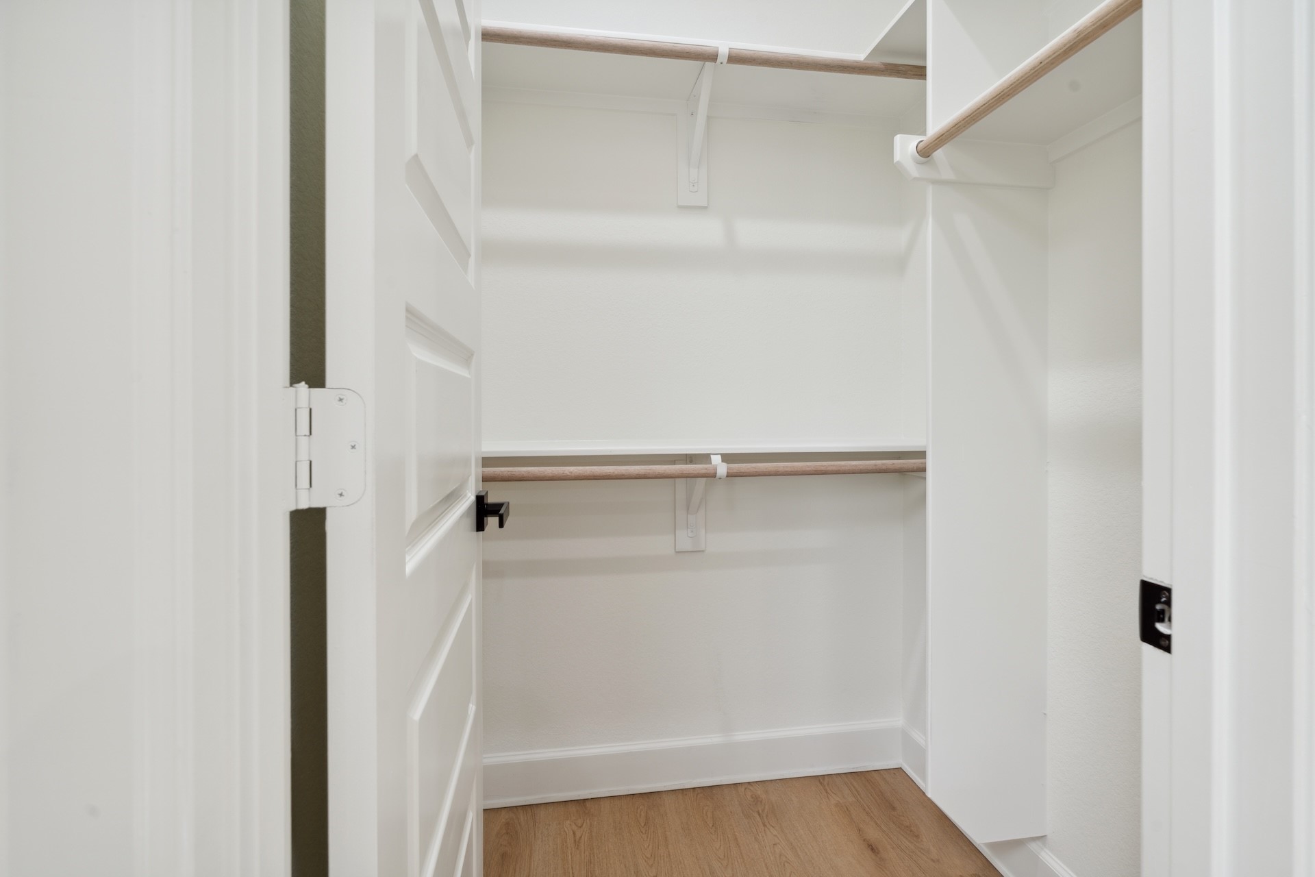 6408 Foster Street Houston, TX 77021 - Photo 17 of 39 Dedicated walk-in closet — multi-level hanging rods and custom built-in shelving maximizes storage potential.