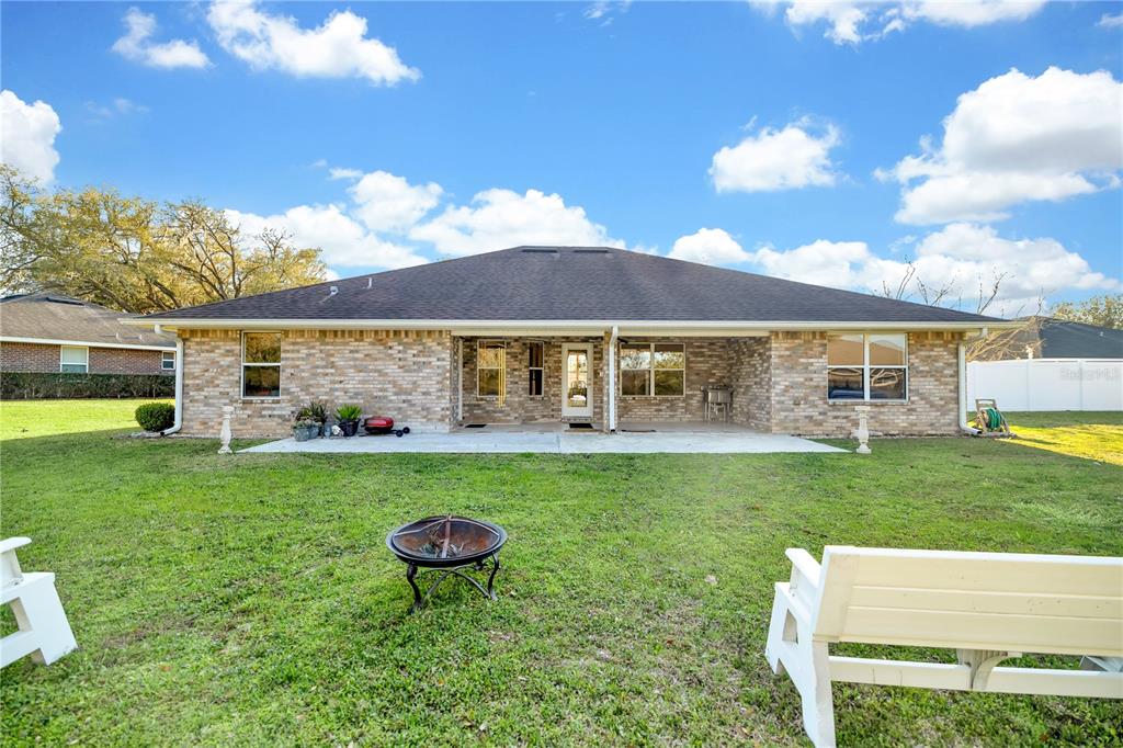 4319 Southwest 63rd Street Ocala, FL 34474 - Photo 25 of 29 a view of an house with backyard space and balcony