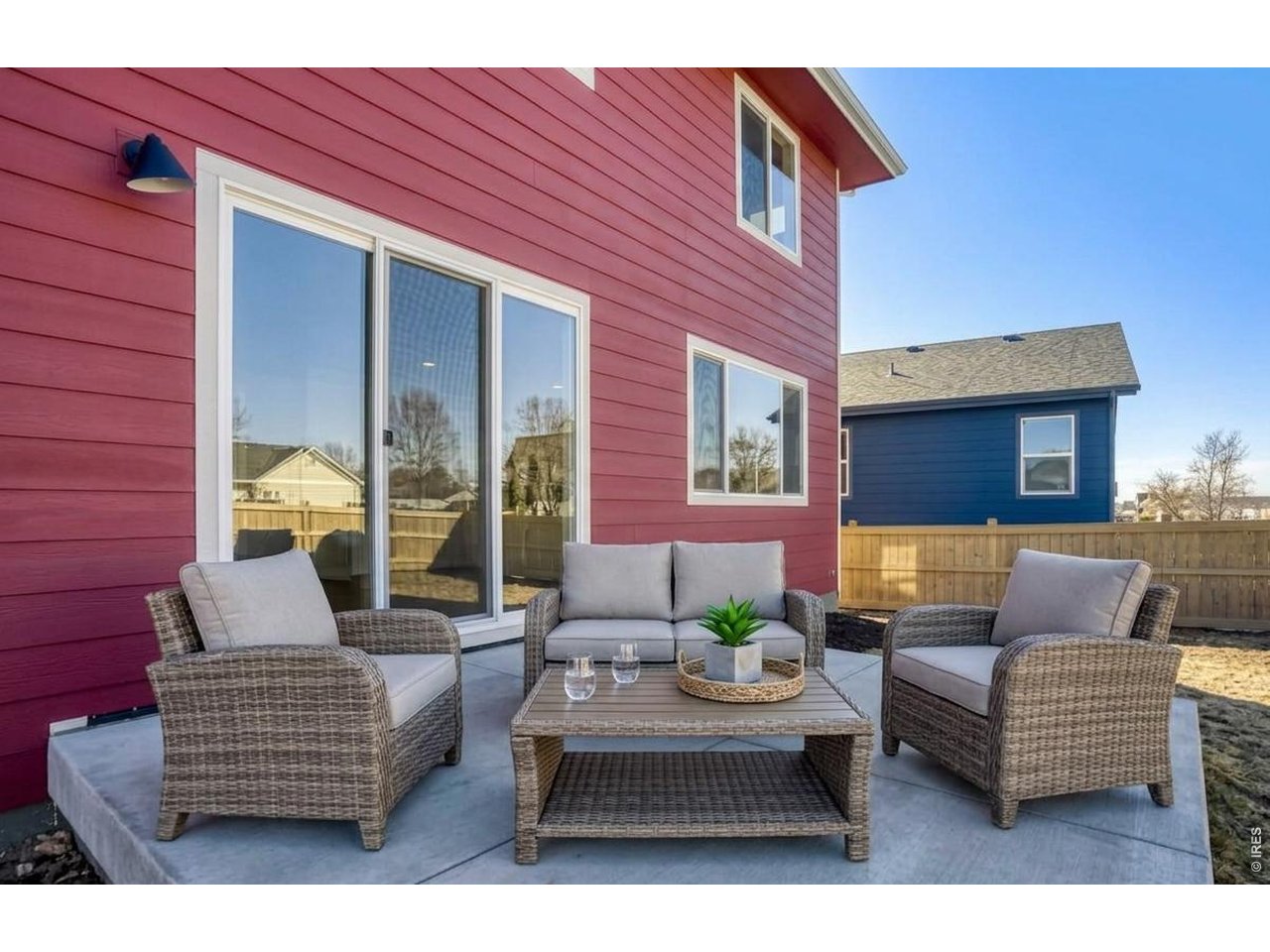 656 Noola Street Windsor, CO 80550 - Photo 22 of 33 CONCRETE PAD - AMAZING ENTERTAINMENT AND BACKYARD RELAXING AREA WITH A FULLY FENCED YARD