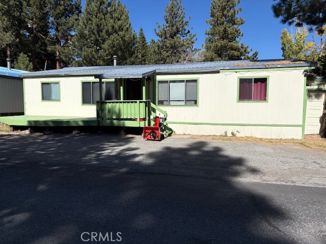 100 Ski Trails Road, Unit 42 Mammoth Lakes, CA 93546 - Photo 14 of 15 a view of a house with backyard