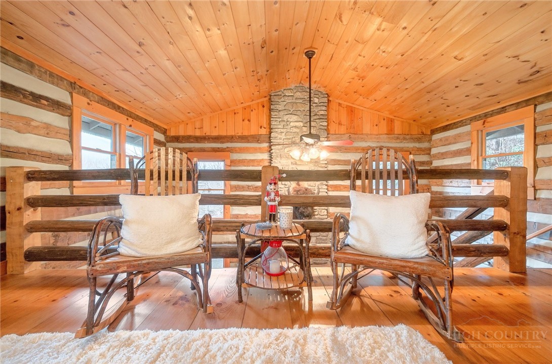 376 Yellow Bear Road Todd, NC 28684 - Photo 21 of 29 a view of a swimming pool and outdoor seating