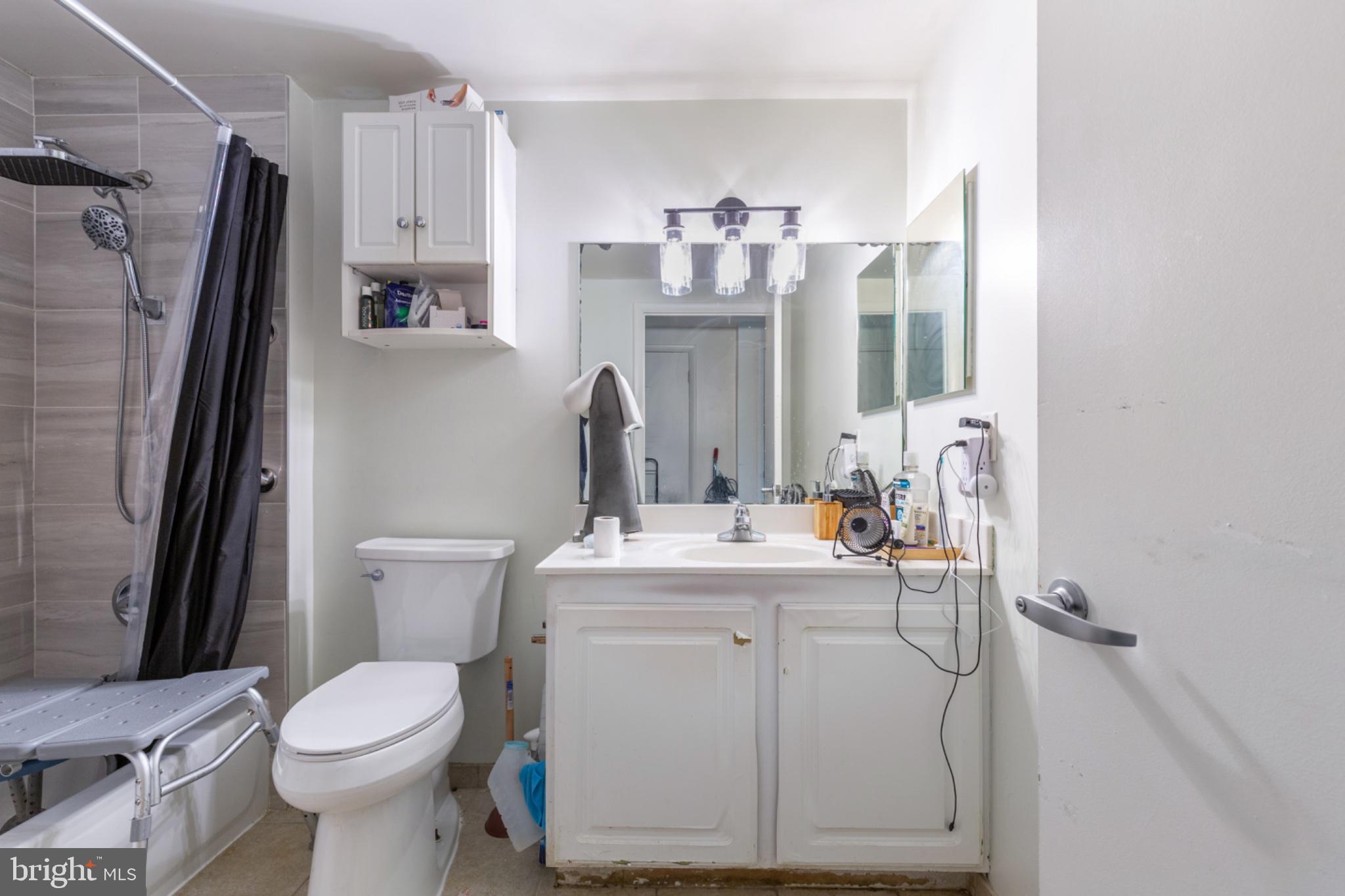 350 G Street Southwest, Unit N423 Washington, DC 20024 - Photo 7 of 43 Bright and functional bathroom oasis.