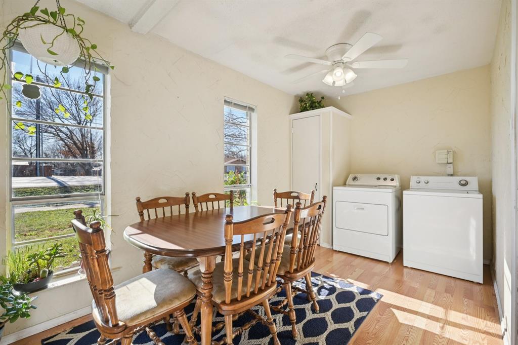 1021 Pleasant Valley Road Garland, TX 75040 - Photo 10 of 32 a dining room with furniture and window