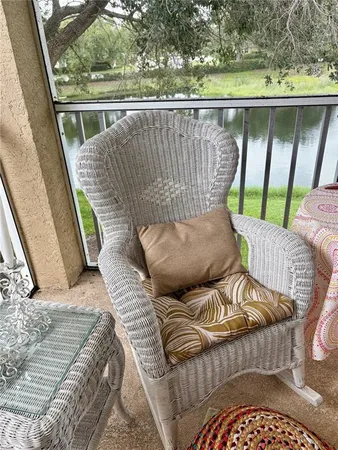a view of a couches in the balcony