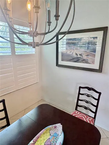 a view of a bedroom with furniture and wooden floor