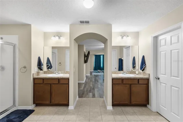 a view of living room with granite countertop furniture and a fireplace