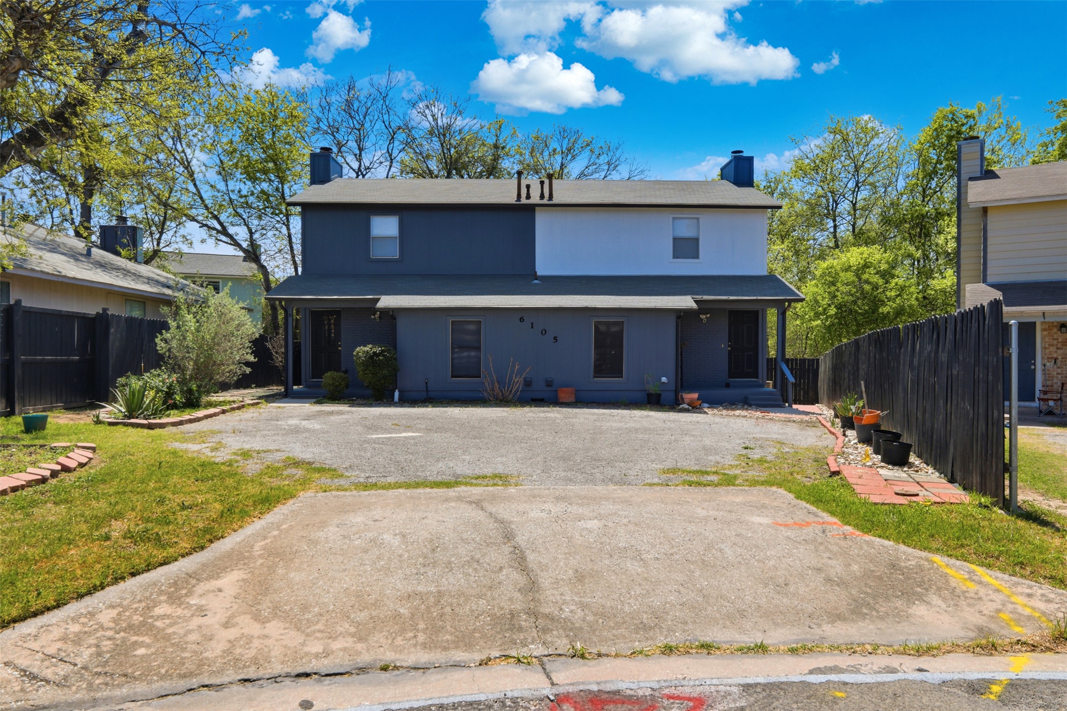 6105 Conti Court, Unit A Austin, TX 78744 - Photo 1 of 36 a view of a house with yard and plants