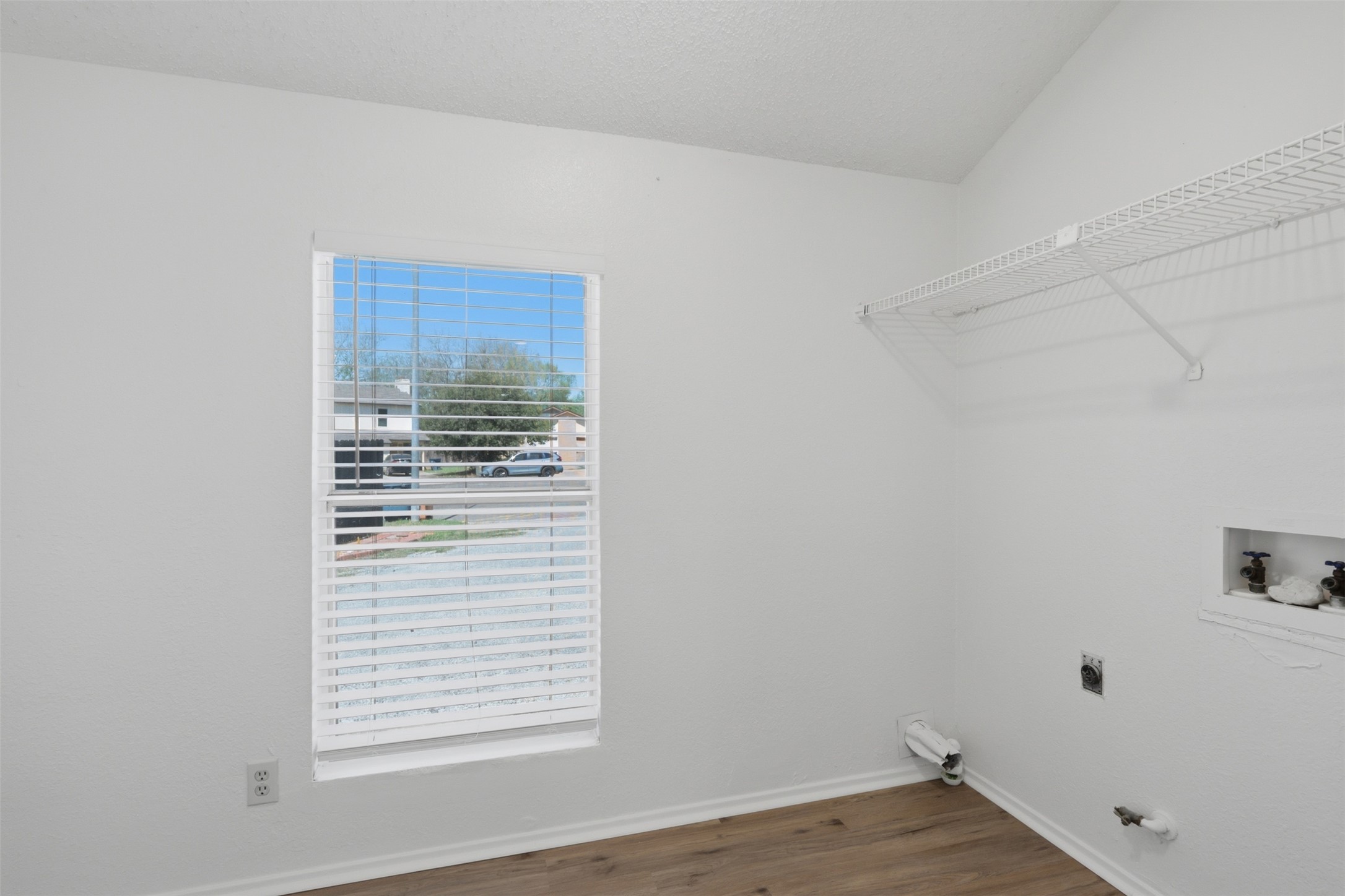 6105 Conti Court, Unit A Austin, TX 78744 - Photo 17 of 36 a view of a room that has a window in it