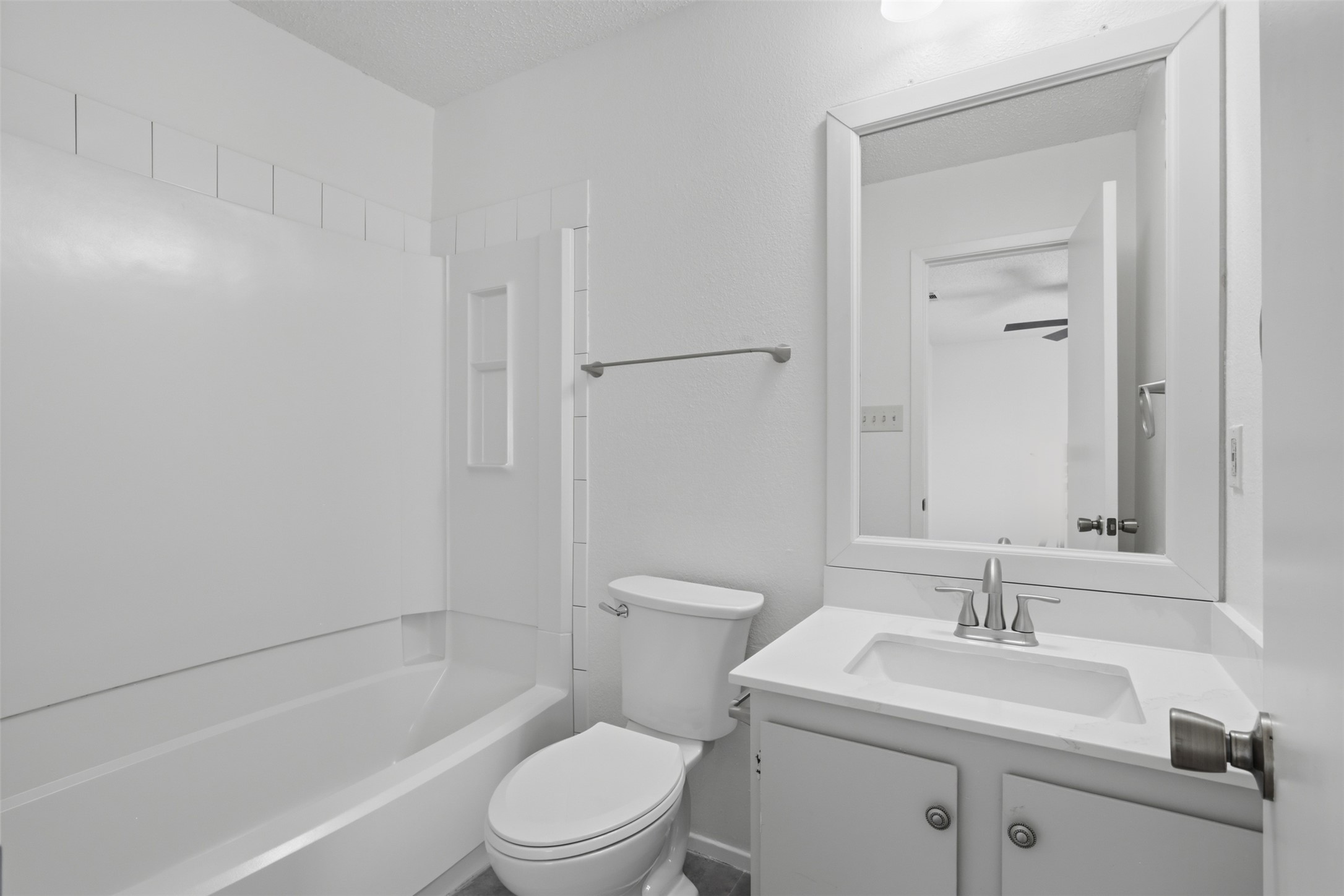 6105 Conti Court, Unit A Austin, TX 78744 - Photo 22 of 36 a bathroom with a sink toilet and shower