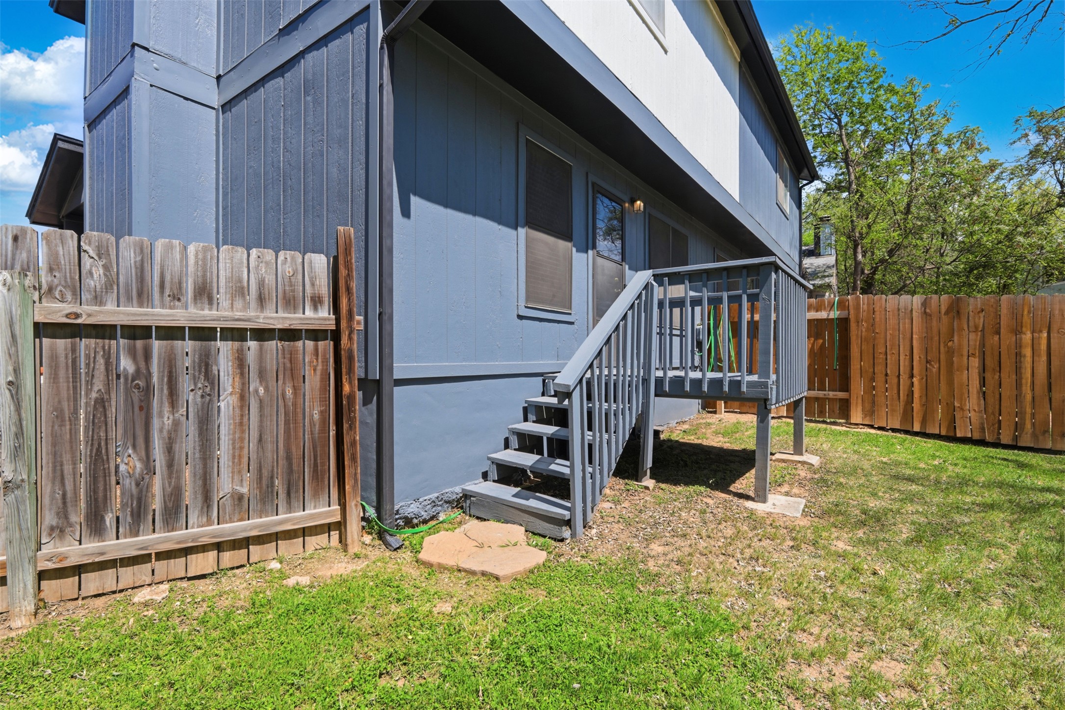 6105 Conti Court, Unit A Austin, TX 78744 - Photo 23 of 36 a view of deck with wooden floor and a fence