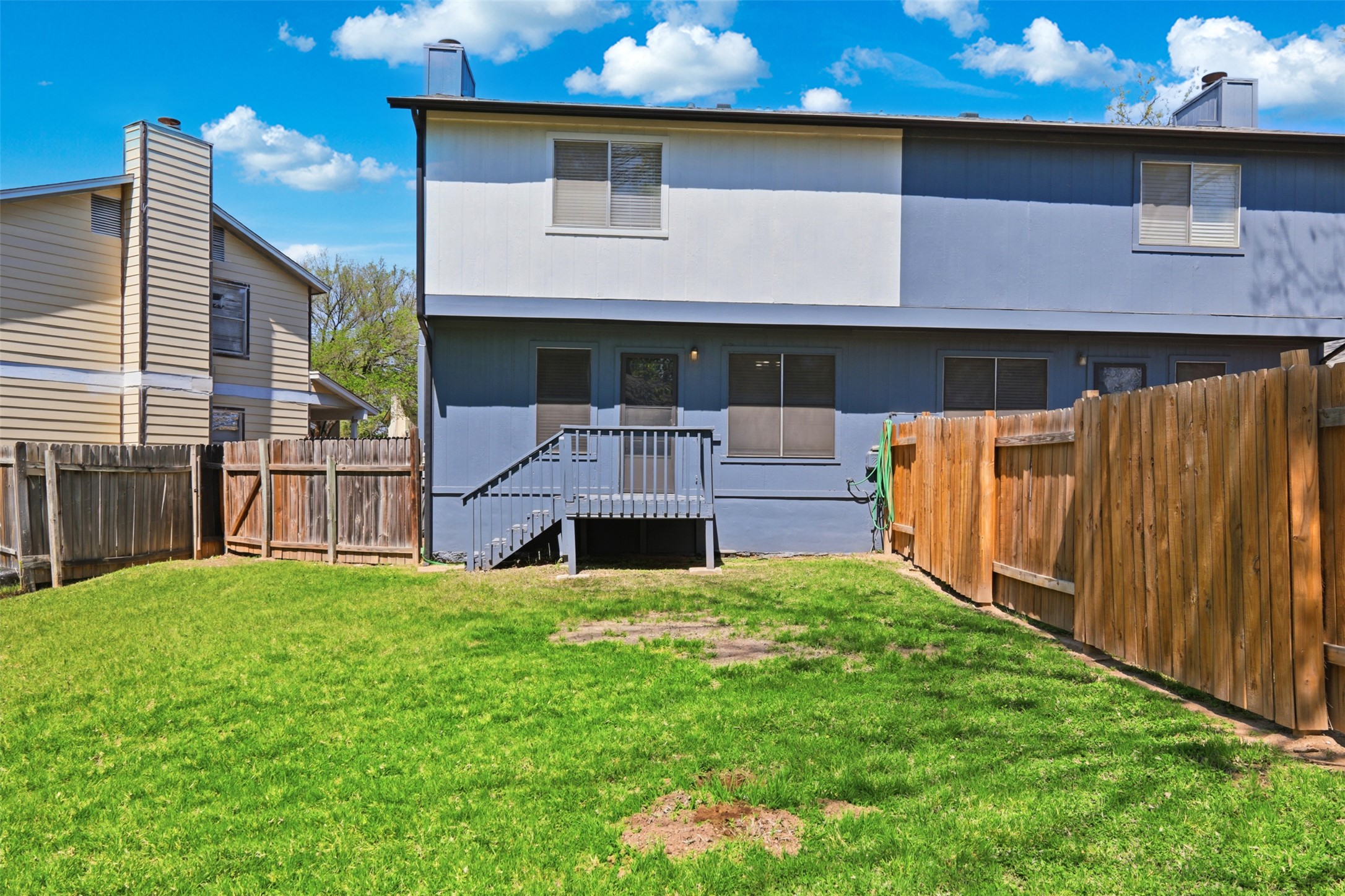 6105 Conti Court, Unit A Austin, TX 78744 - Photo 25 of 36 a view of front a house with a yard