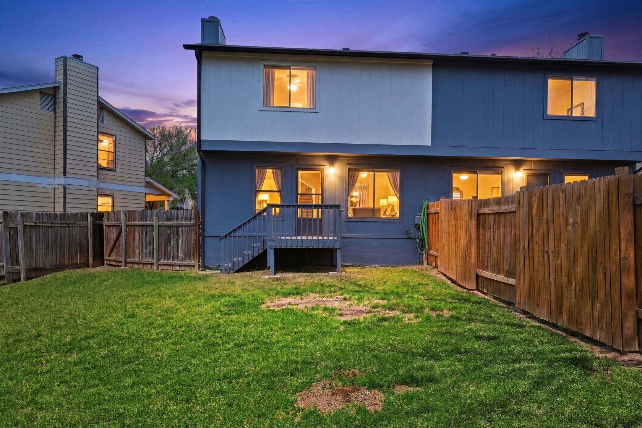 6105 Conti Court, Unit A Austin, TX 78744 - Photo 29 of 36 a view of a house with backyard and porch