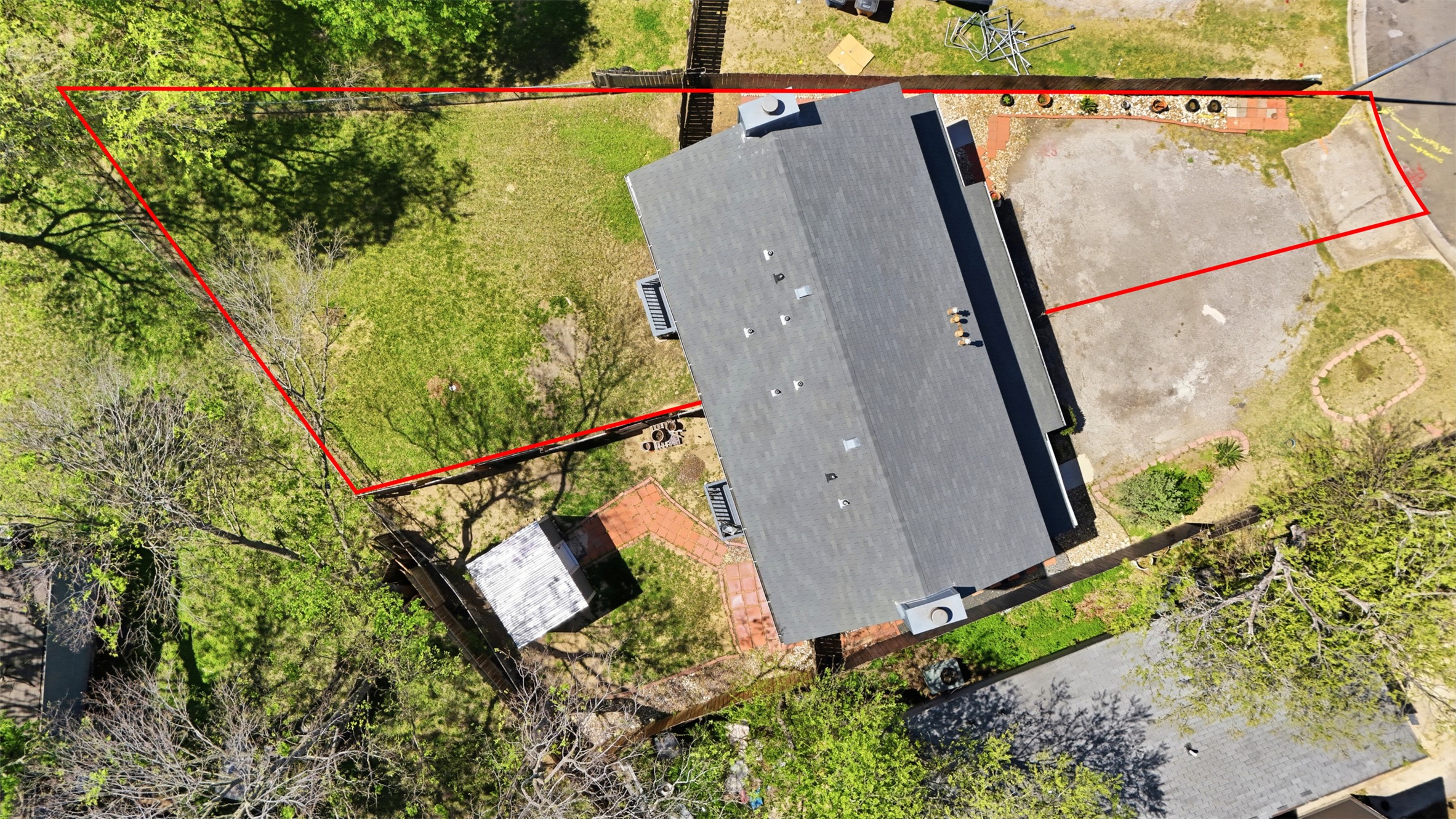6105 Conti Court, Unit A Austin, TX 78744 - Photo 32 of 36 an aerial view of a house having yard