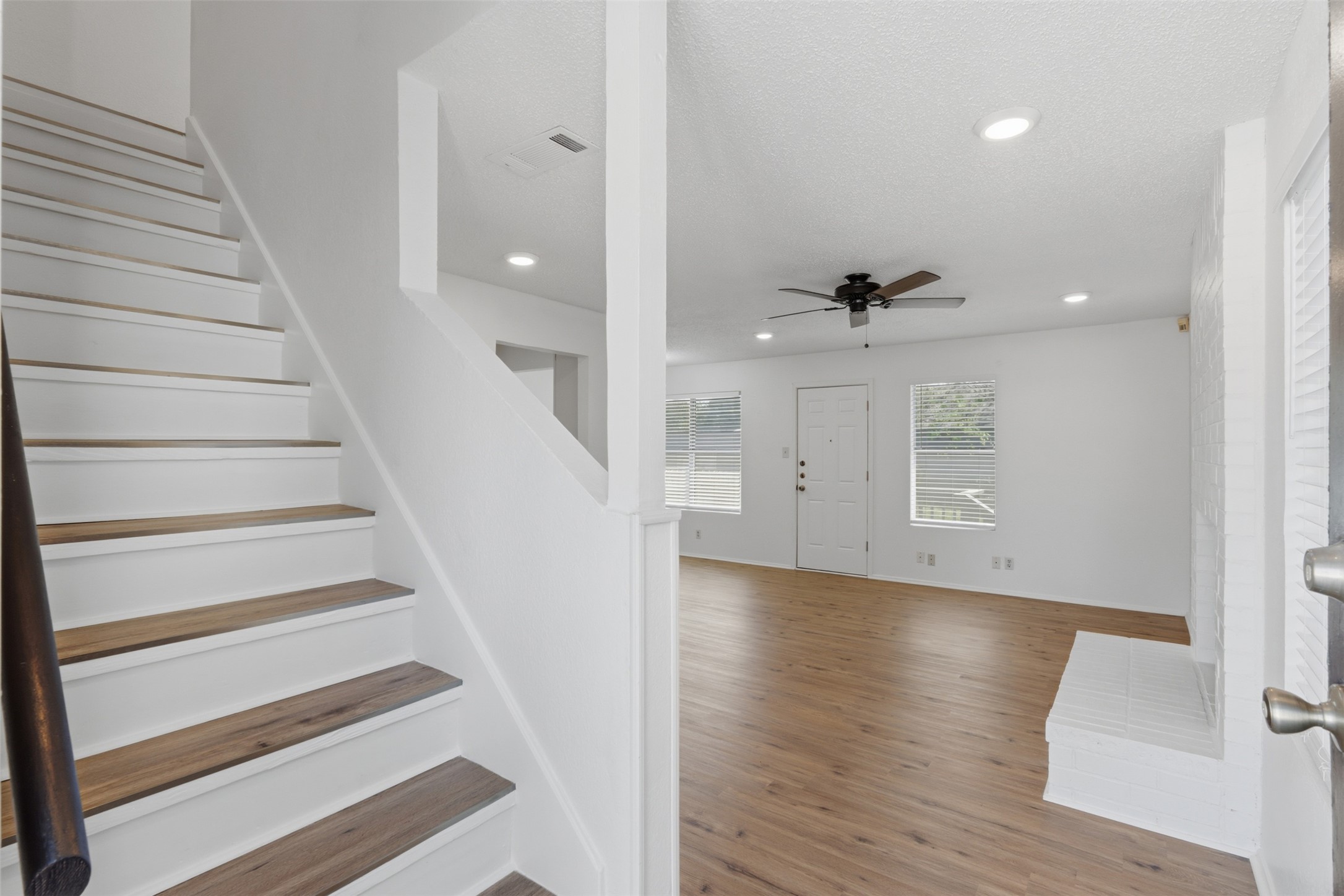 6105 Conti Court, Unit A Austin, TX 78744 - Photo 5 of 36 a view of an entryway with wooden floor