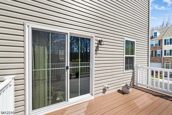 a view of backyard with deck