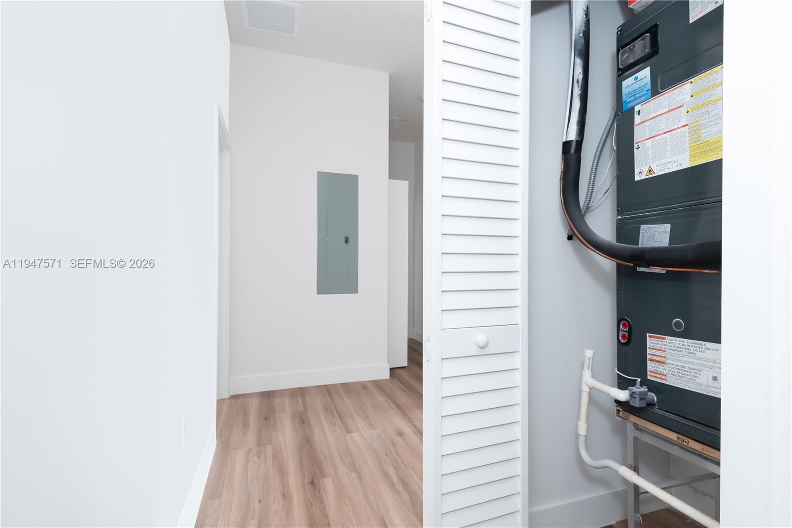 4517 Northwest 3rd Street Miami, FL 33126 - Photo 27 of 34 a view of walk in closet with clothes and shoes