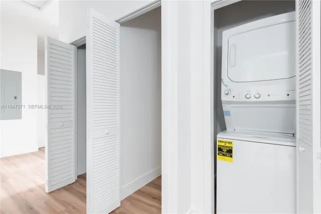 a close view of a utility room with washer and dryer