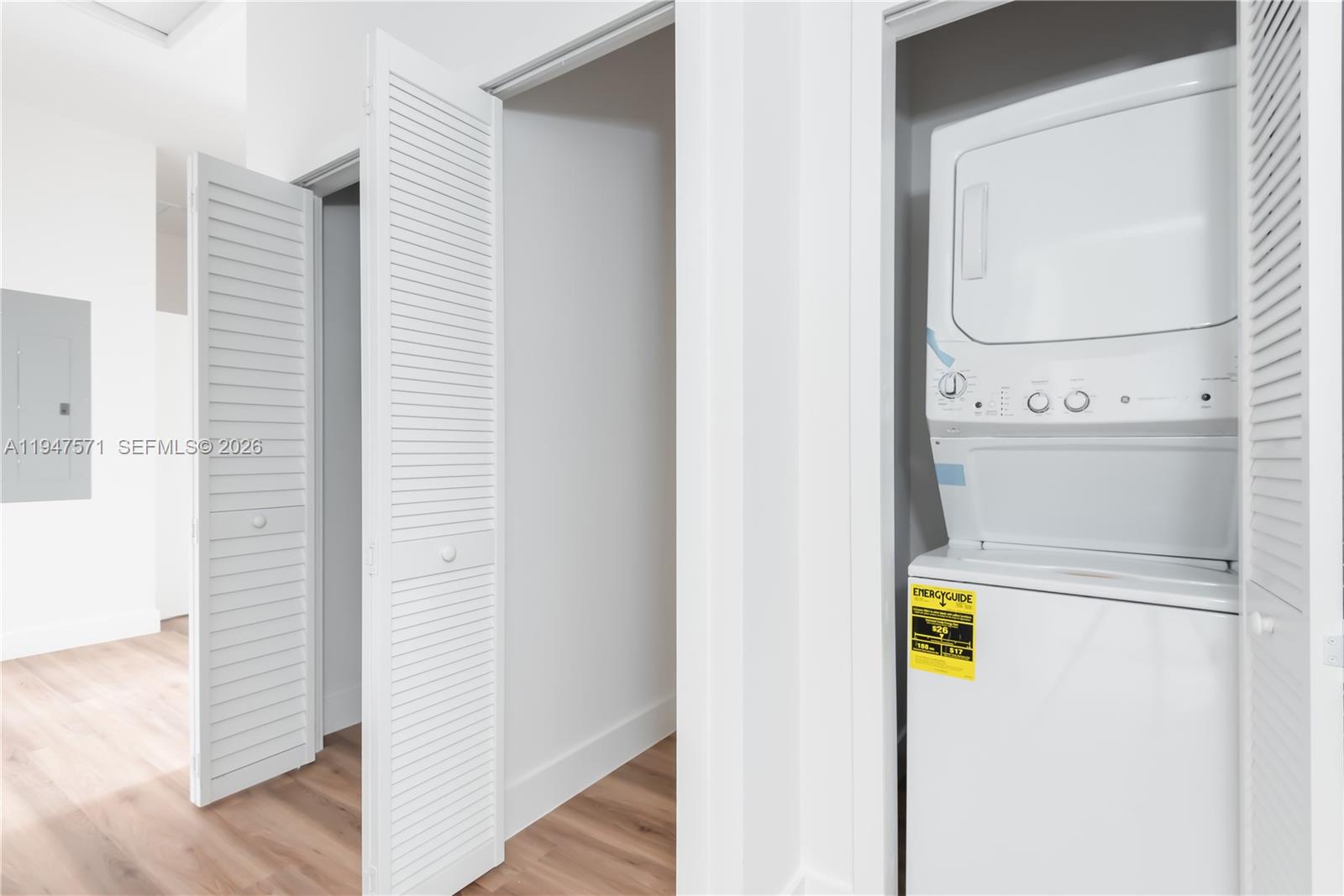 4517 Northwest 3rd Street Miami, FL 33126 - Photo 28 of 34 a close view of a utility room with washer and dryer