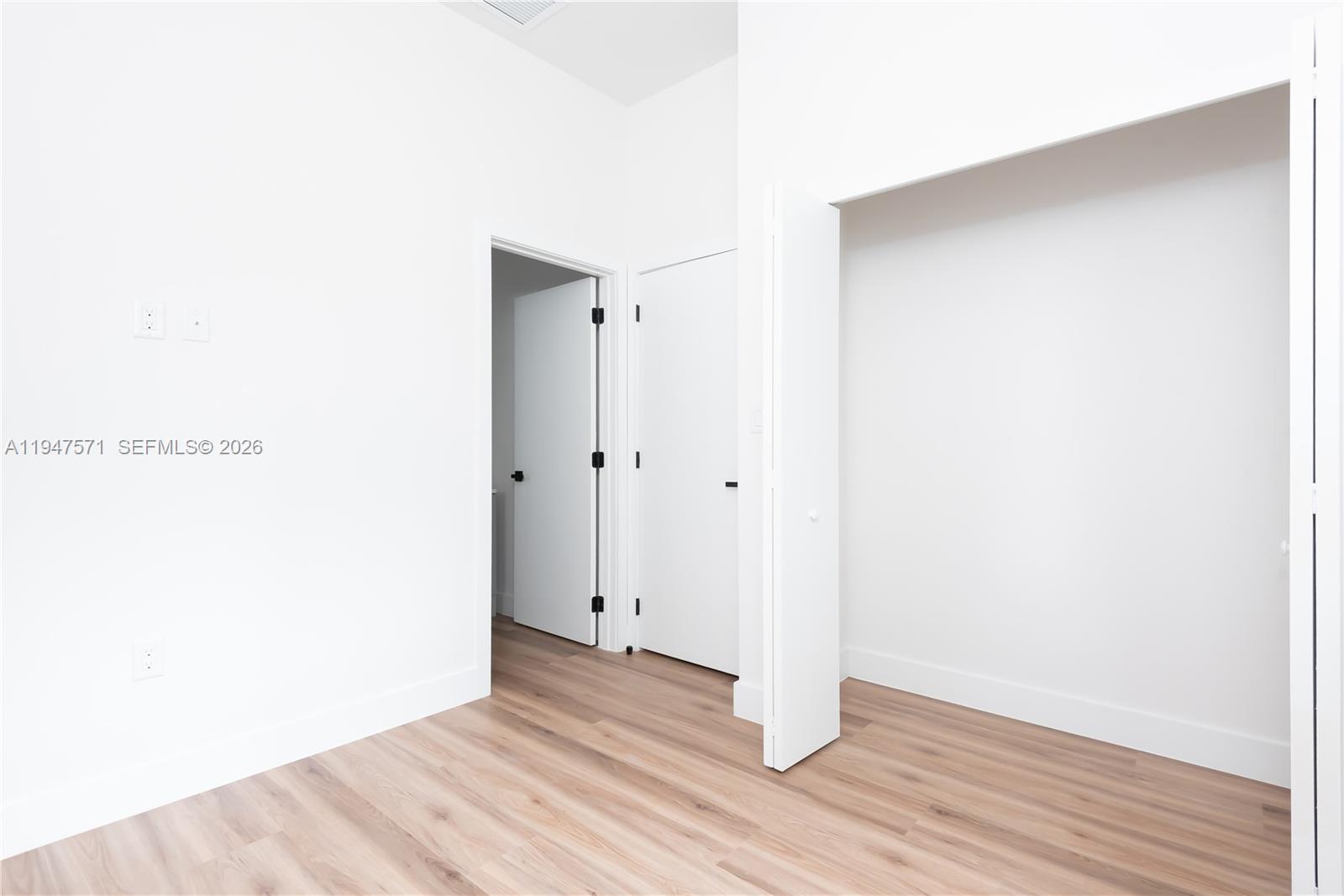 4517 Northwest 3rd Street Miami, FL 33126 - Photo 34 of 34 a view of a room with wooden floor