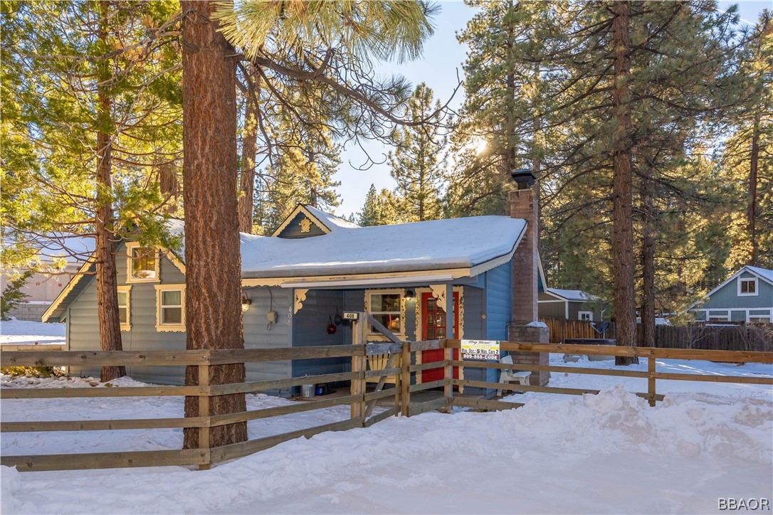 a view of a car park in front of house