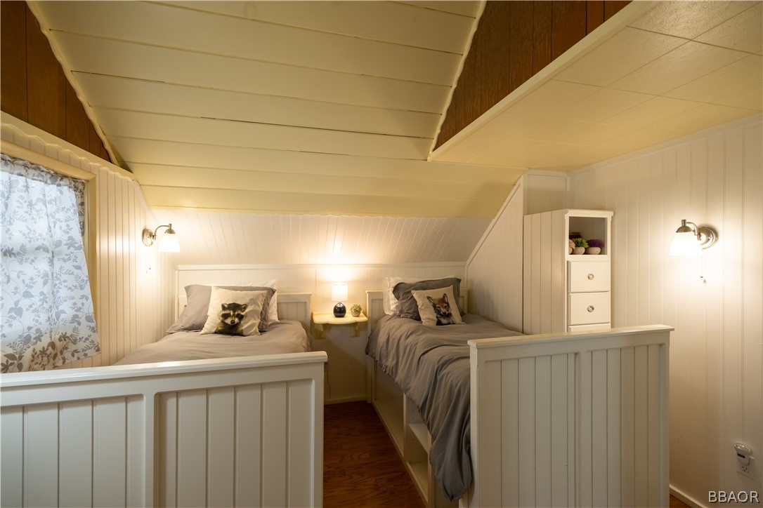 408 Conklin Road Big Bear Lake, CA 92315 - Photo 17 of 24 a bedroom with a bed and a window