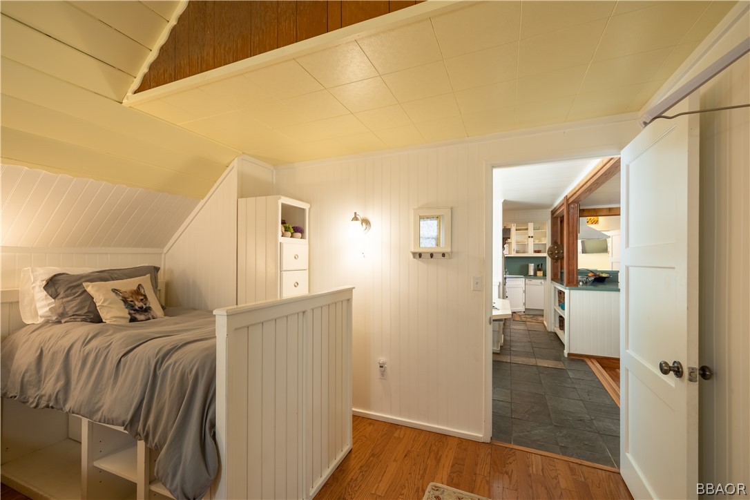 408 Conklin Road Big Bear Lake, CA 92315 - Photo 18 of 24 a view of walk in closet with clothes and shoes