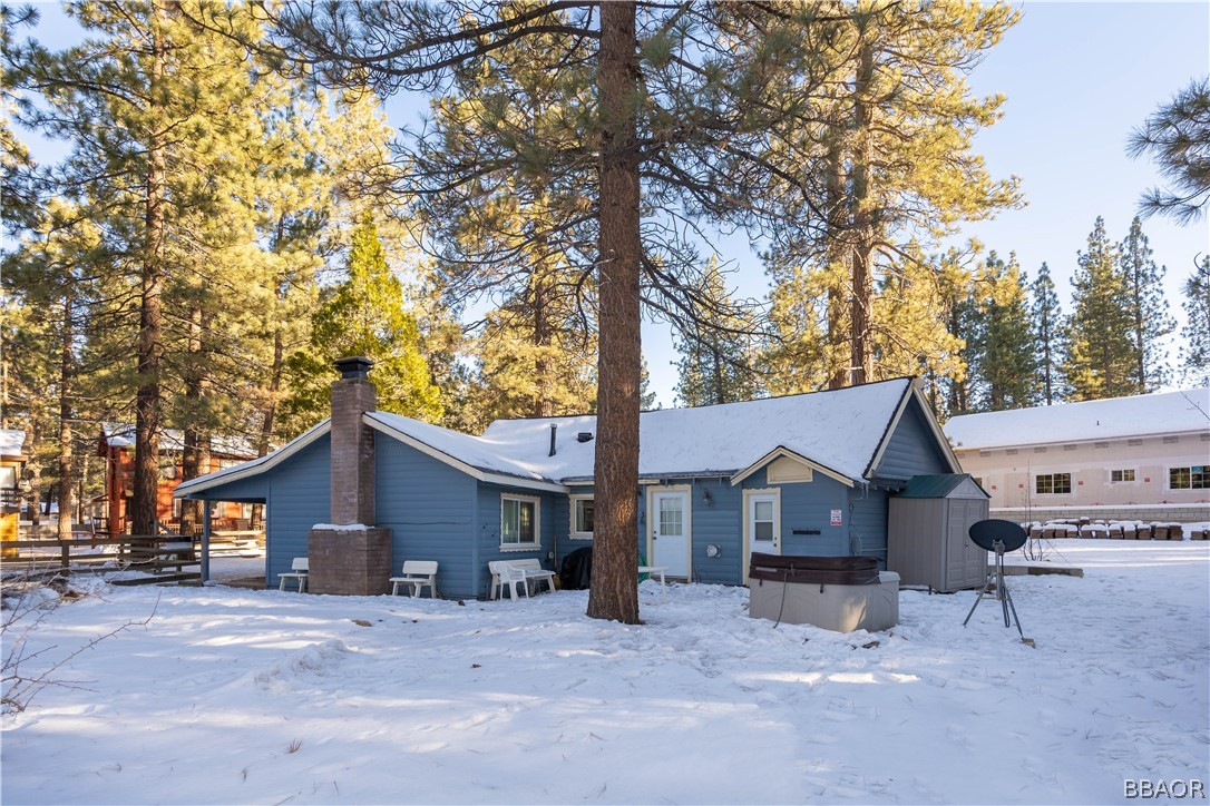 408 Conklin Road Big Bear Lake, CA 92315 - Photo 23 of 24 a wooden house with trees in front of it