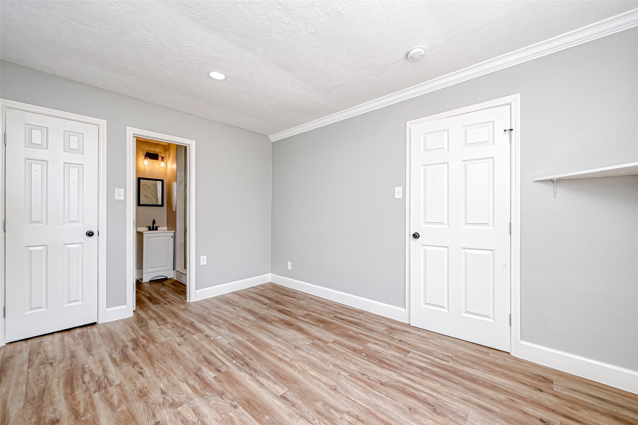 6715 Victoria Street Houston, TX 77020 - Photo 19 of 46 a view of an empty room with wooden floor