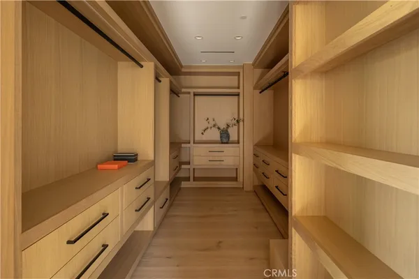 a bathroom with a shower and a sink