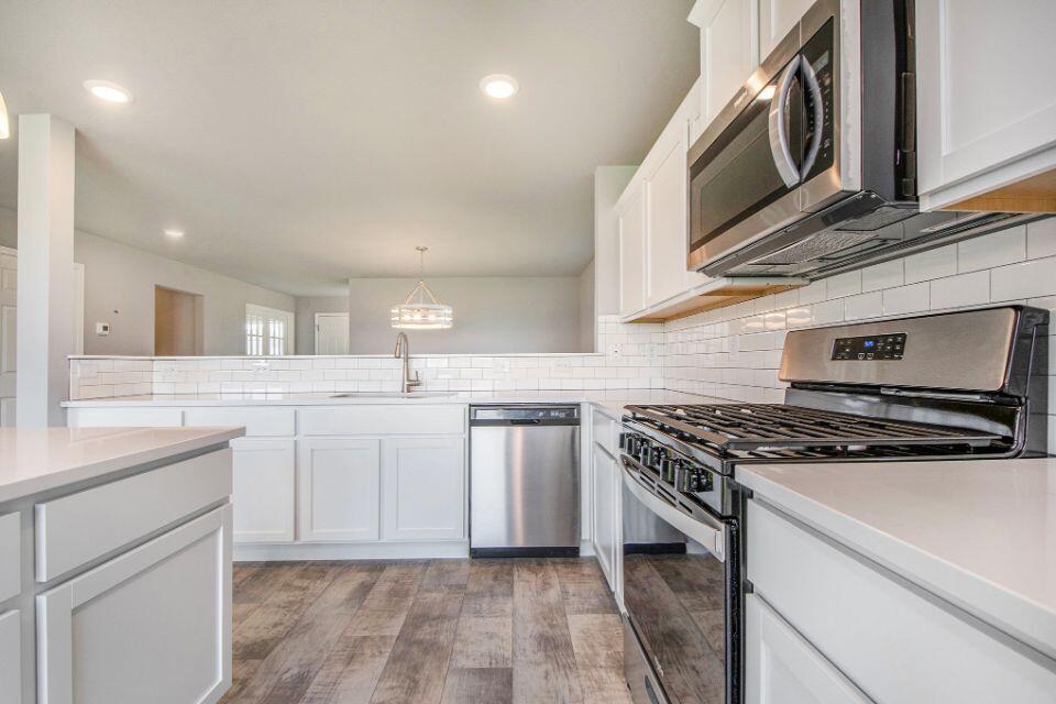 7620 Storey Road Belding, MI 48809 - Photo 5 of 28 4-STG135-i2280-Kitchen2