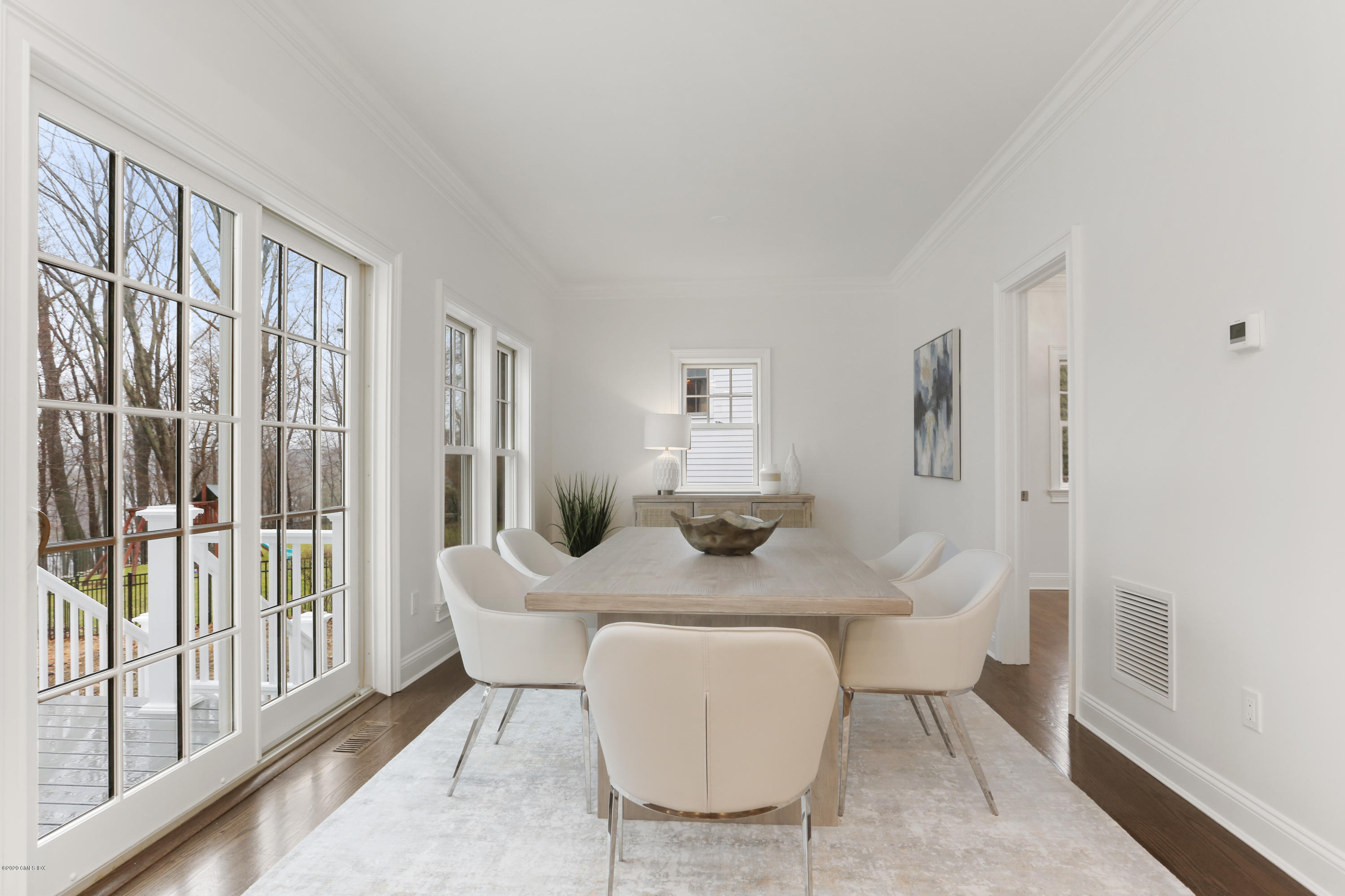72 Riverside Lane Riverside, CT 06878 - Photo 13 of 40 a dining room with furniture and wooden floor