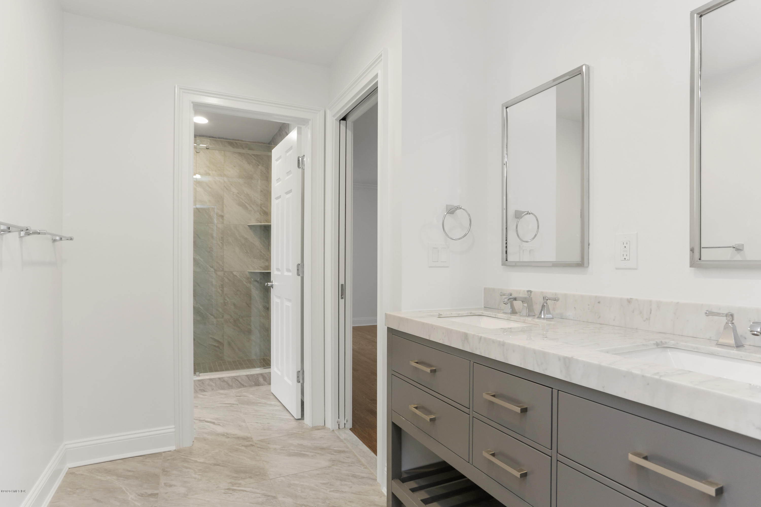 72 Riverside Lane Riverside, CT 06878 - Photo 30 of 40 a bathroom with a sink and a mirror