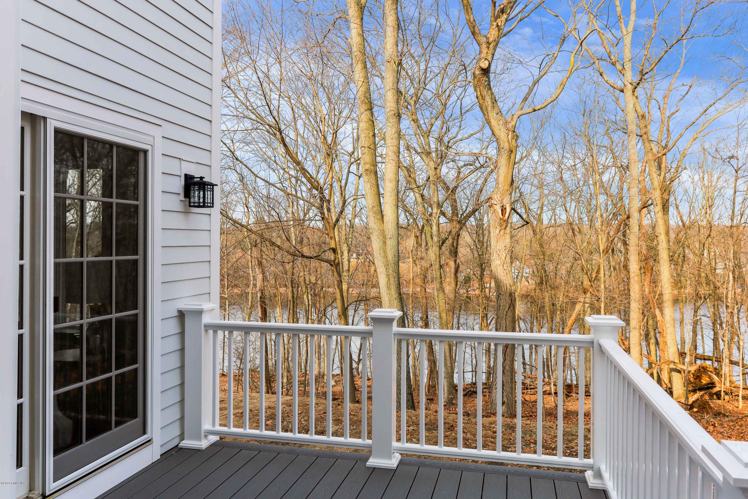 72 Riverside Lane Riverside, CT 06878 - Photo 4 of 40 a view of a wooden fence and a window