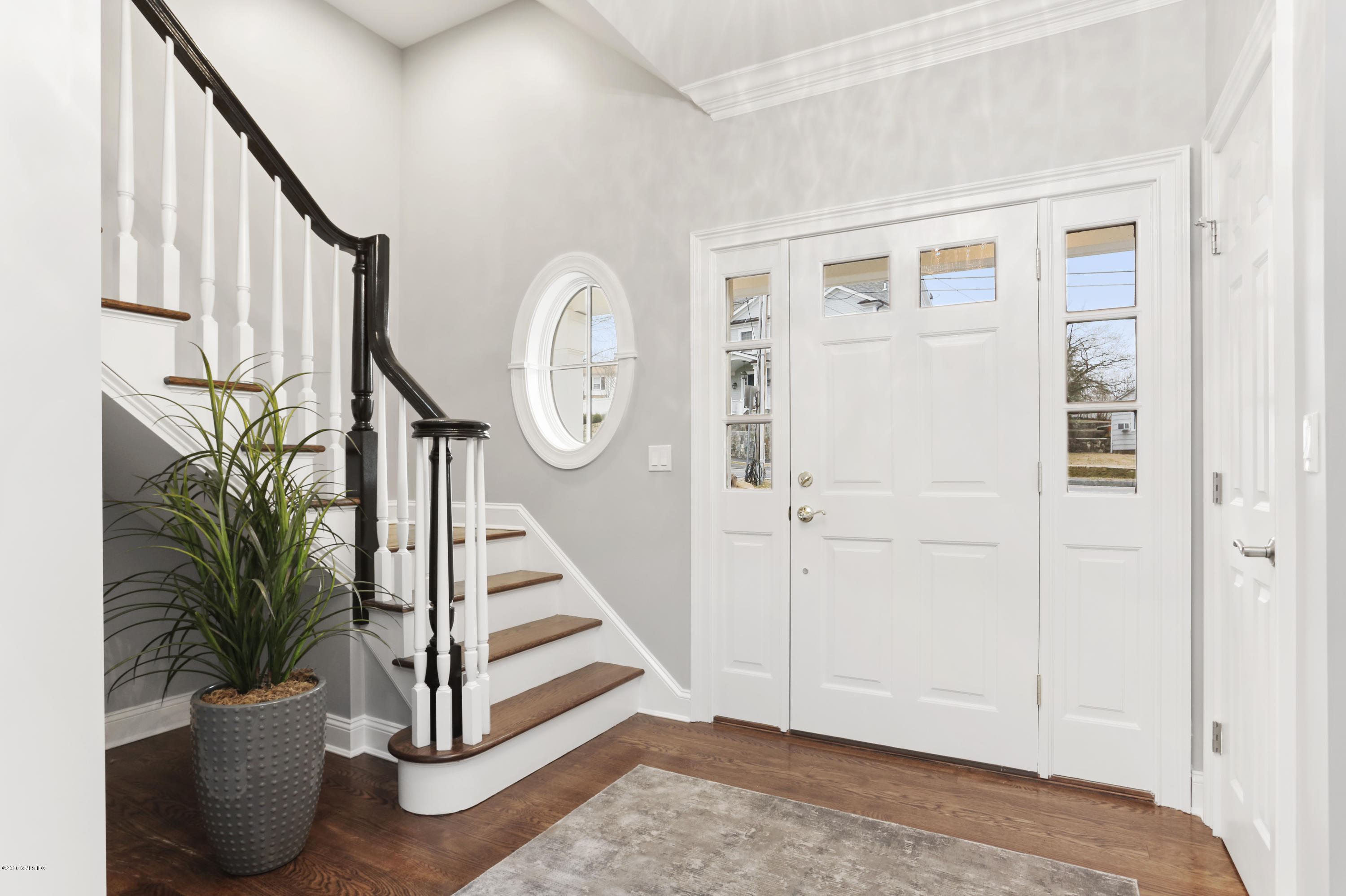 72 Riverside Lane Riverside, CT 06878 - Photo 6 of 40 a view of a entryway with wooden floor