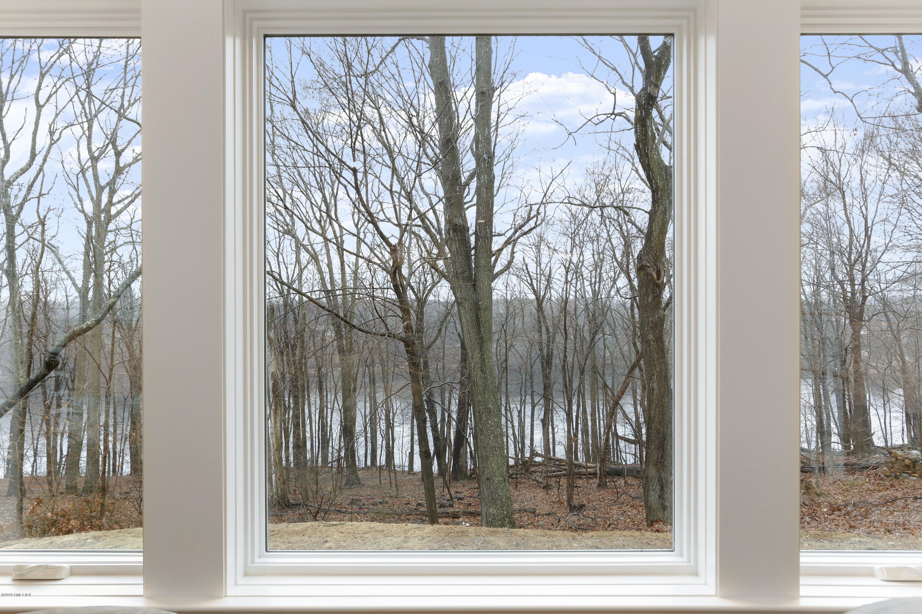 72 Riverside Lane Riverside, CT 06878 - Photo 9 of 40 a view of a wooden door