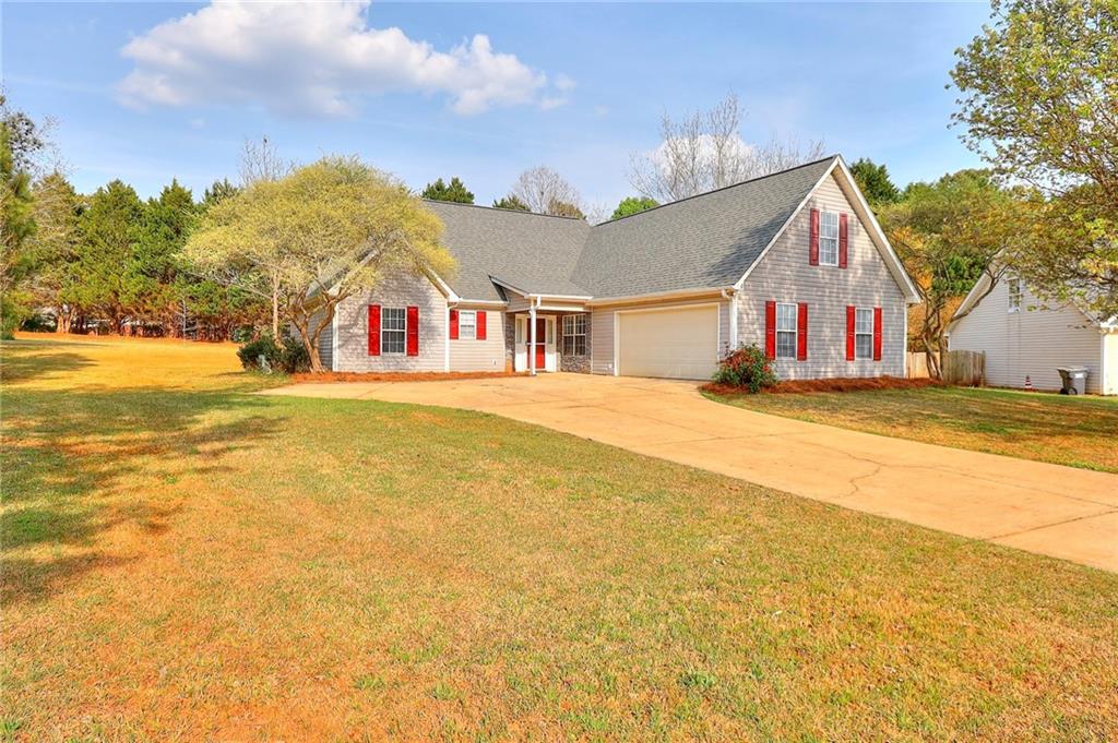 a view of swimming pool in front of residential houses