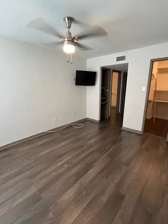 a bathroom with a shower and a glass door shower